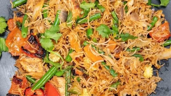 This is an image of a stir-fry chicken meal.